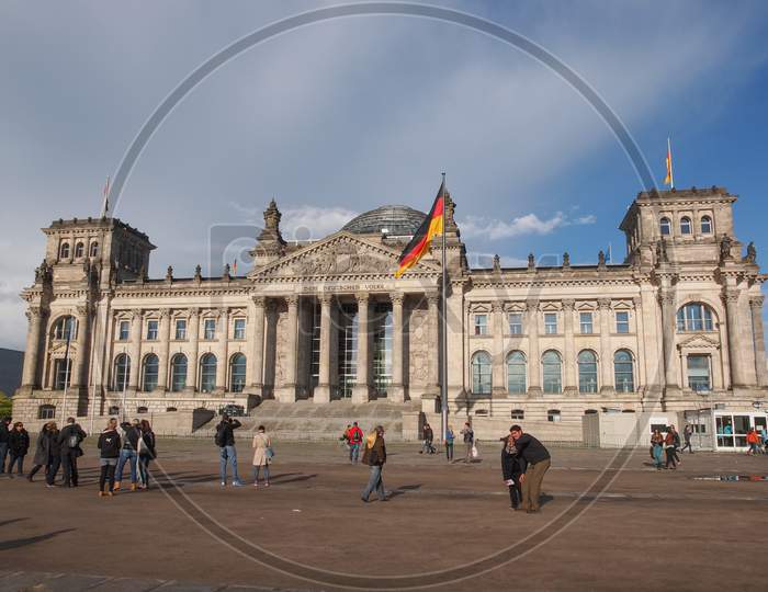 Berlin, Germany - May 11, 2014: Tourists Visiting The Reichstag (German Parliament) In Tiergarten Park