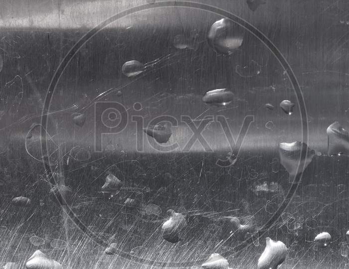 Water Drops On Grey Steel Texture Background