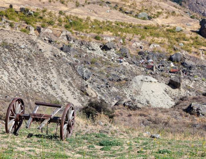 Ripponvale, Central Otago, New Zealand - February 17 : Old Wooden Cannon Carriage In The Gold Mining Area Of Ripponvale In New Zealand On February 17, 2012. Two Unidentified People