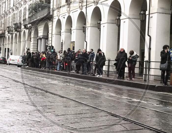 Turin, Italy - Circa November 2018: People At Bus Stop In Via Po