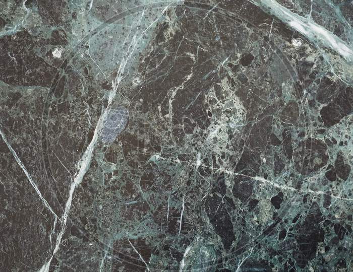 Glossy Green And Black Marble Texture Background