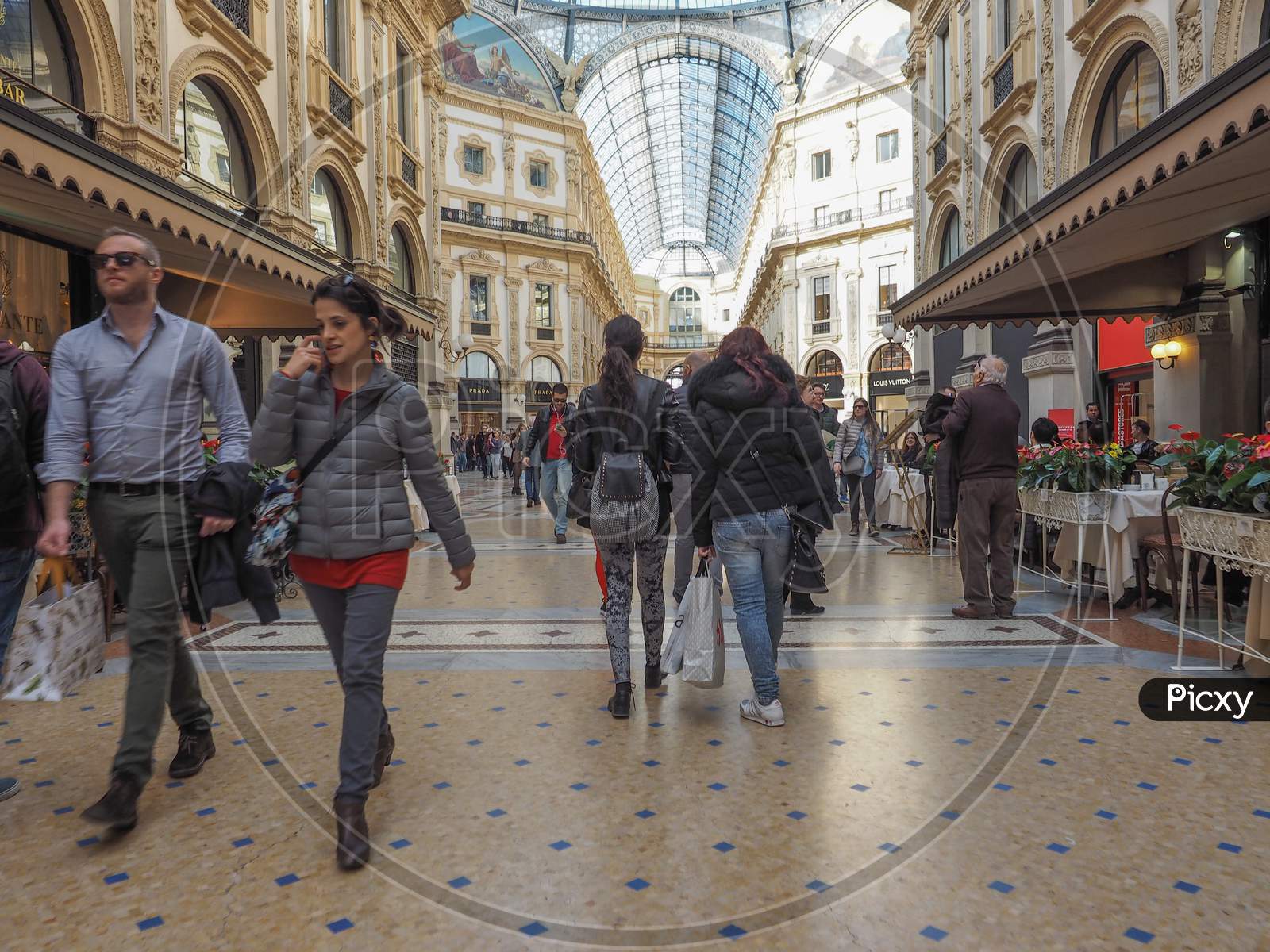 Milan, Italy - March 28, 2015: People Visiting The Newly Restored Galleria Vittorio Emanuele Ii