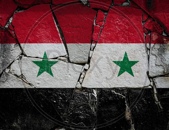 National Flag Of Syria Depicting In Paint Colors On An Old Stone Wall. Flag  Banner On Broken  Wall Background.