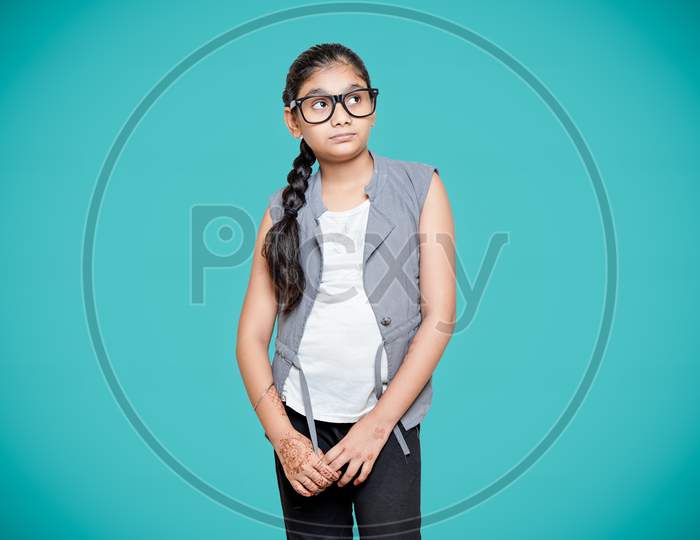 Cute Indian Little Girl Thinking Big Idea