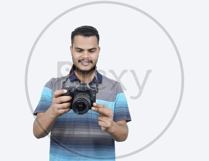 young Indian men with camera
