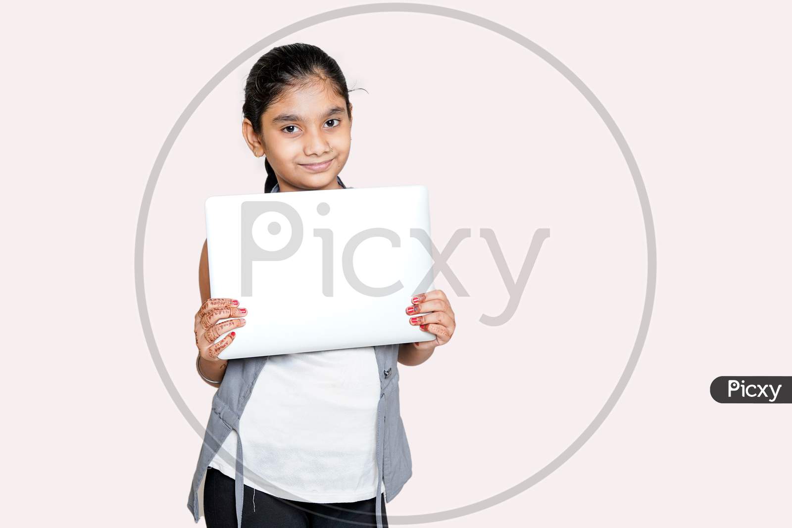 Indian Girl Holds Laptop