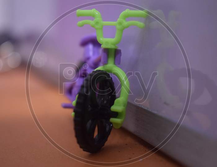 small toy cycle placed with white background