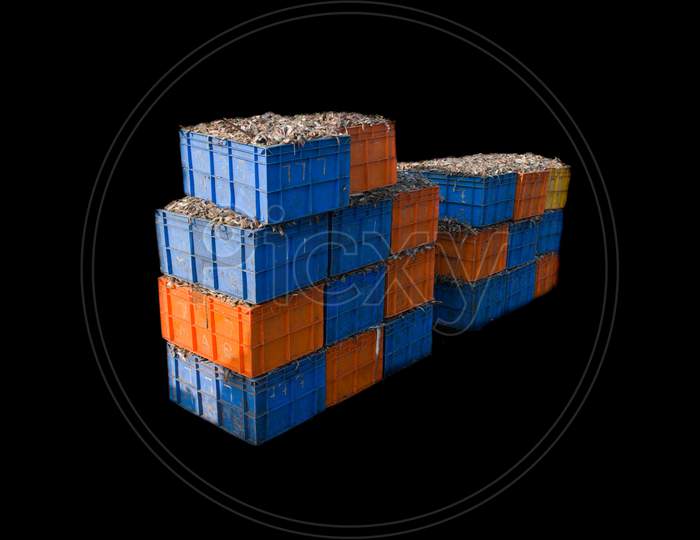 Indian Fish Export Containers Tower Isolated On Black.