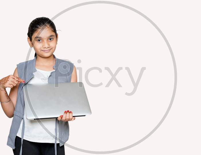 Indian Girl Holds Laptop