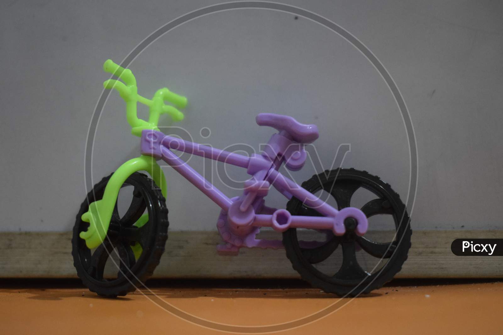 small toy cycle placed with white background