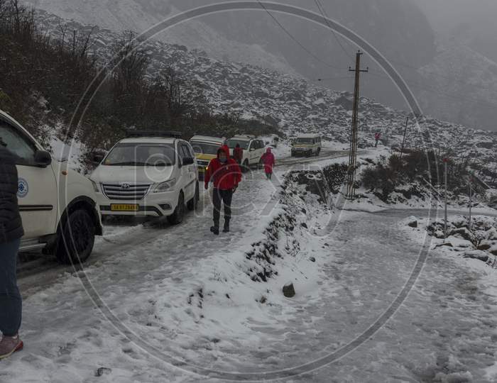 Road Blocked Due To Heavy Snowfall At Yumthang Valley, Sikkim And Tourists Walking On Roads To See The Condition.