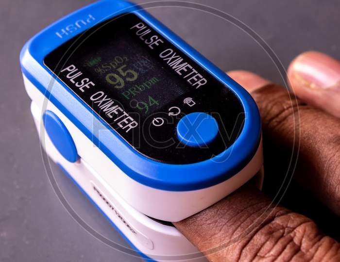 Pulse Oximeter Device Used To Measure Blood Oxygen Saturation Along With Heart Rate. O2 Monitor Finger For Oxygen