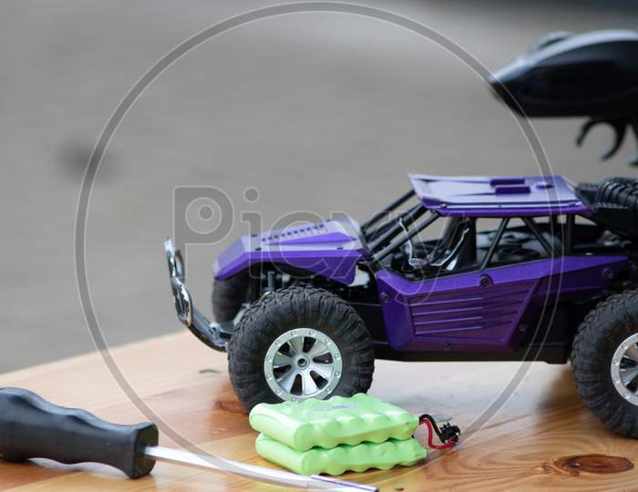 Off road rc car with remote control and battery ready to race in competition and tournaments in radio controlled challenges and outdoor parcours as fun for children and grown ups and rally hobby track