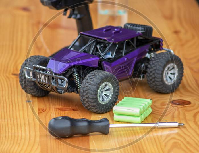 Off road rc car with remote control and battery ready to race in competition and tournaments in radio controlled challenges and outdoor parcours as fun for children and grown ups and rally hobby track