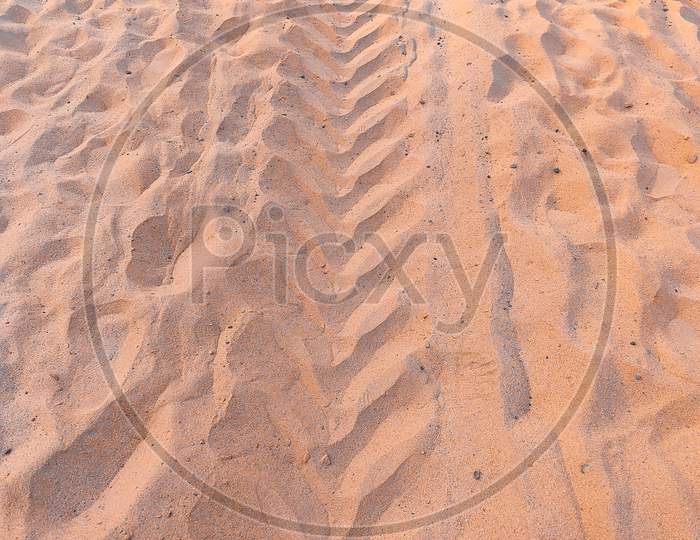Tracks Wheels Marks In Sand Field Land
