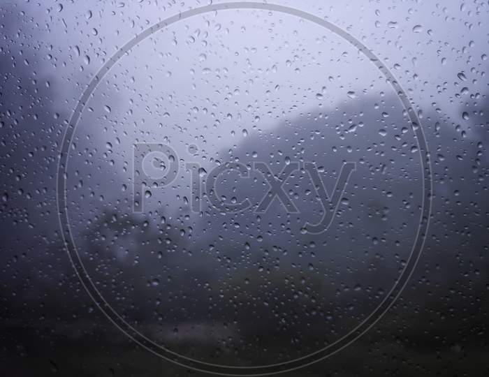 Condensation On The Clear Glass Window. Water Drops. Rain. Abstract Background Texture, India.
