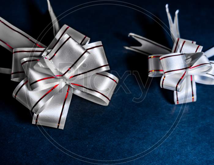 Image of Pull Flower Ribbon for Gift Wrap Lighting Effect On Black  Background Wallpaper Image Beautiful Abstract Scenario Image-GZ548500-Picxy