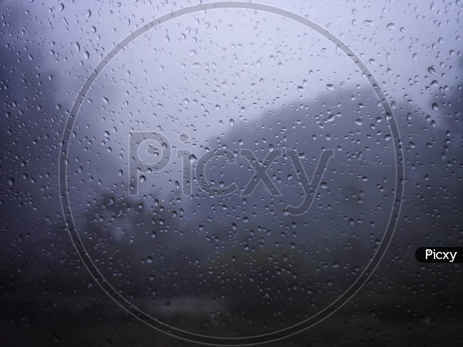 Condensation On The Clear Glass Window. Water Drops. Rain. Abstract Background Texture, India.