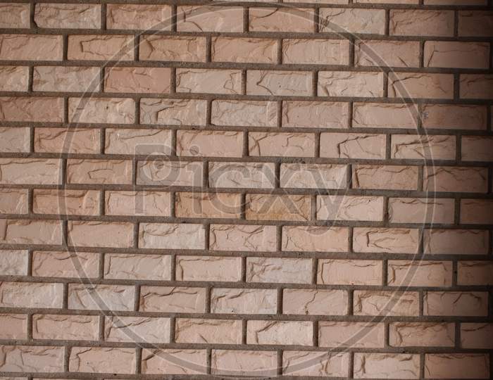 Dholpuri Sandstone Tile Wall From Rajasthan India, Texture Of A Stone Wall. Old Castle Stone Wall Texture Background. Stone Wall As A Background Or Texture. Part Of A Stone Wall, For Background Or Texture