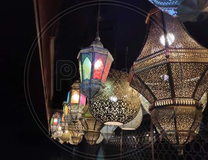 Beautiful Multicolored Arabic Lamps Glowing At Night In A Market, Traditional Decorative Arabian Lights, On Sale In The Traditional Bazaar, Beautifully Decorated Arabian Lanterns Hanging From An Old Restaurant.