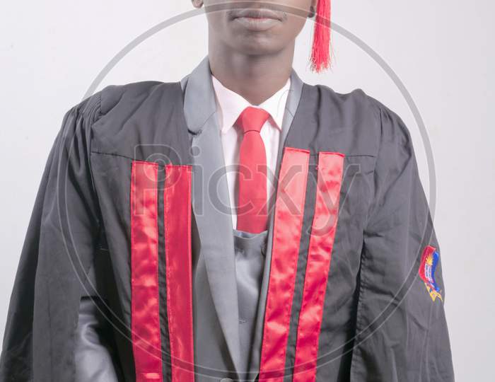 Black African American young man wearing his graduation crown