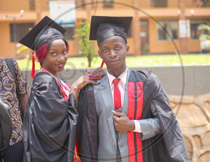 boy friend girl friend graduate on their graduation day