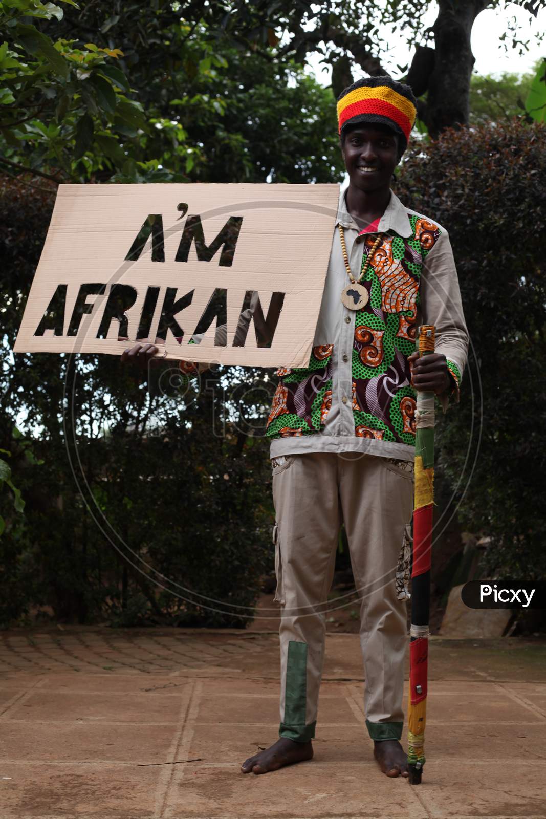 Image of Black African man raster man meditation on the floor in the ...