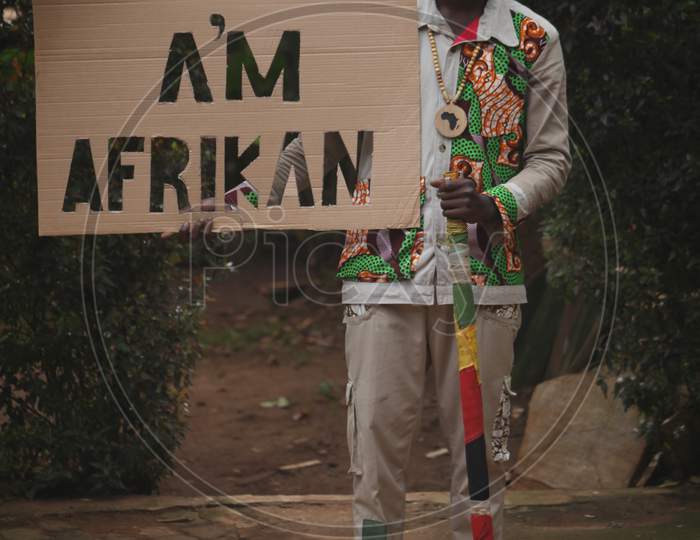 Image of Black African man raster man meditation on the floor in the ...