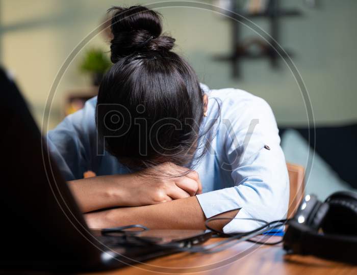 Young Business Woman Sleeping By Closing Laptop While Working, Concept Of New Normal Burnout, Over Or Late Night Work At Home During Coronavirus Covid-19 Pandemic
