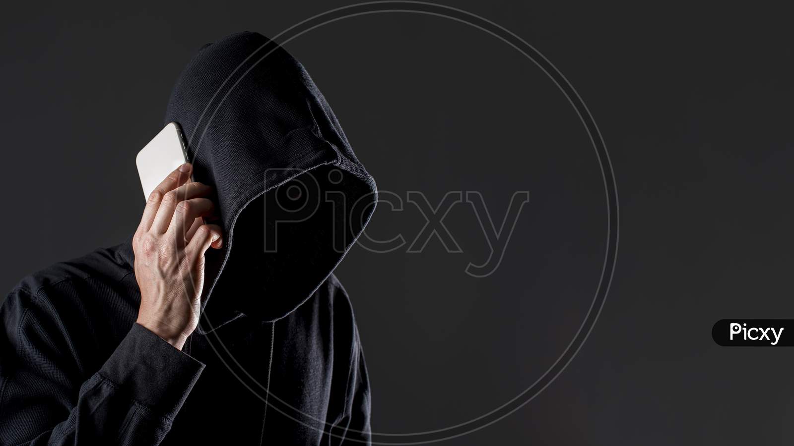 side view male hacker talking smartphone with copy space
