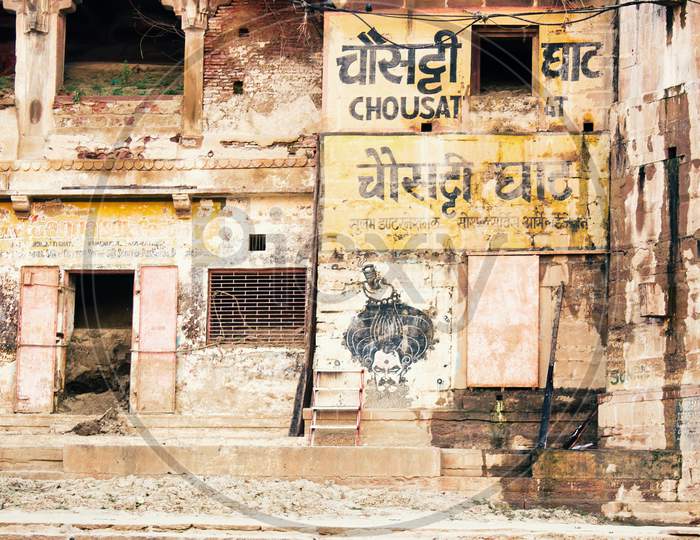 Varanasi, India - November 01, 2016: Chausati Ghat Graffiti Written On Rusty Old Wall Showing Ancient Hindu Culture In A Famous Landmark In Banaras In The State Of Uttar Pradesh.