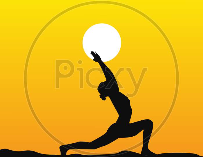 A woman does yoga on the beach