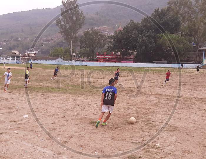 Football players in a Football match at Seppa General Ground at Seppa