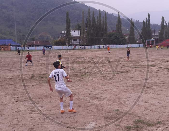 Football players in a Football match at Seppa General Ground at Seppa
