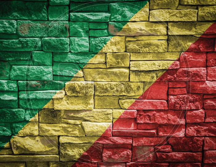 National Flag Of Republic Of The Congo On Stone  Wall Background.The Concept Of National Pride And Symbol Of The Country. Flag  Banner On  Stone Texture Background.