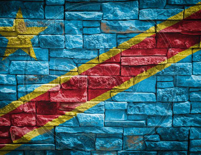 National Flag Of Democratic Republic Of The Congo On Stone  Wall Background.The Concept Of National Pride And Symbol Of The Country. Flag  Banner On  Stone Texture Background.