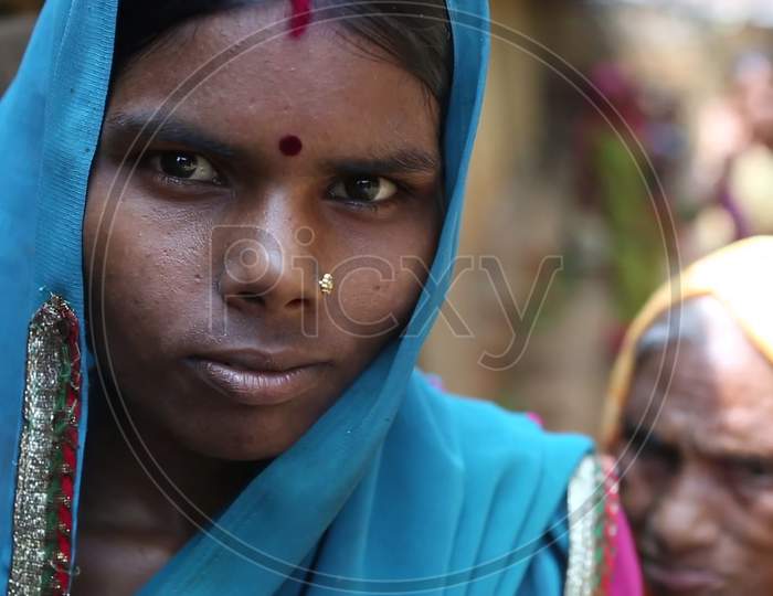 unidentified Indian woman wearing traditional sari dress