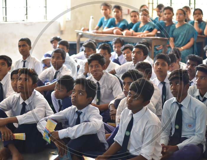 Group of unidentified Indian students of government school inside the class  and enjoying class activity