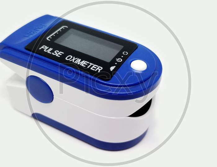 A Pulse oximeter isolated in white background