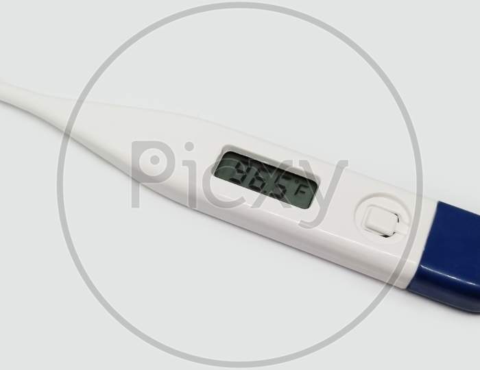 A digital thermometer isolated in white background