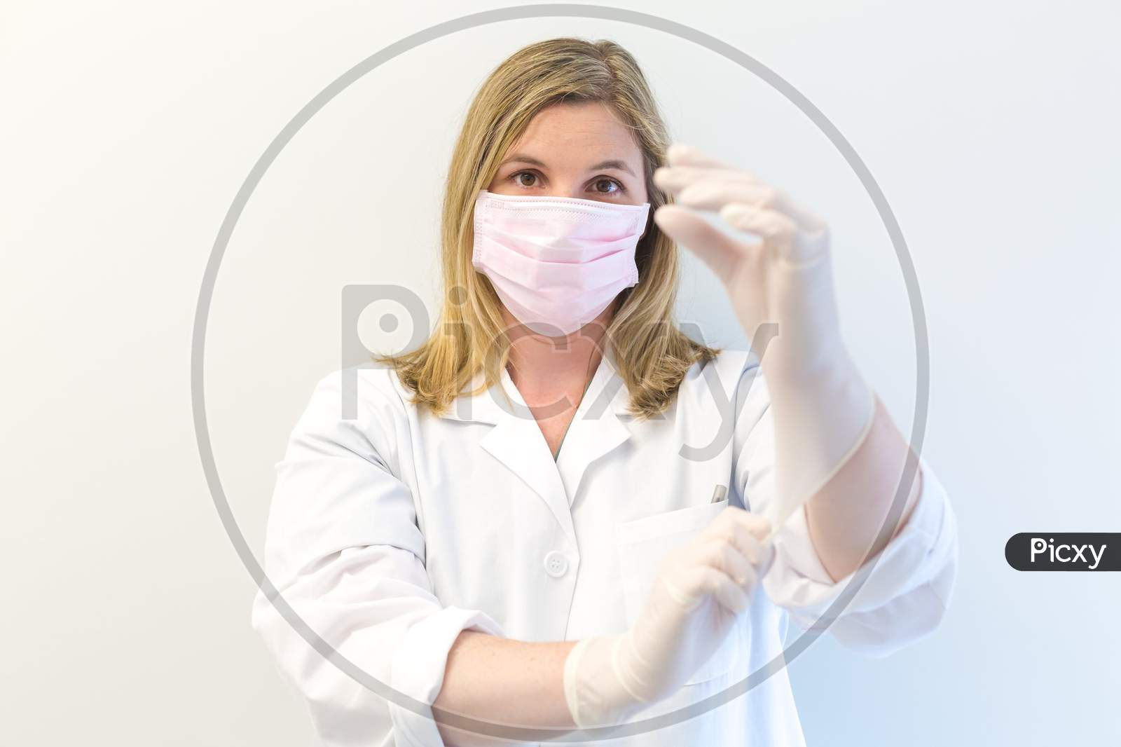 Doctor with mask and gloves ....