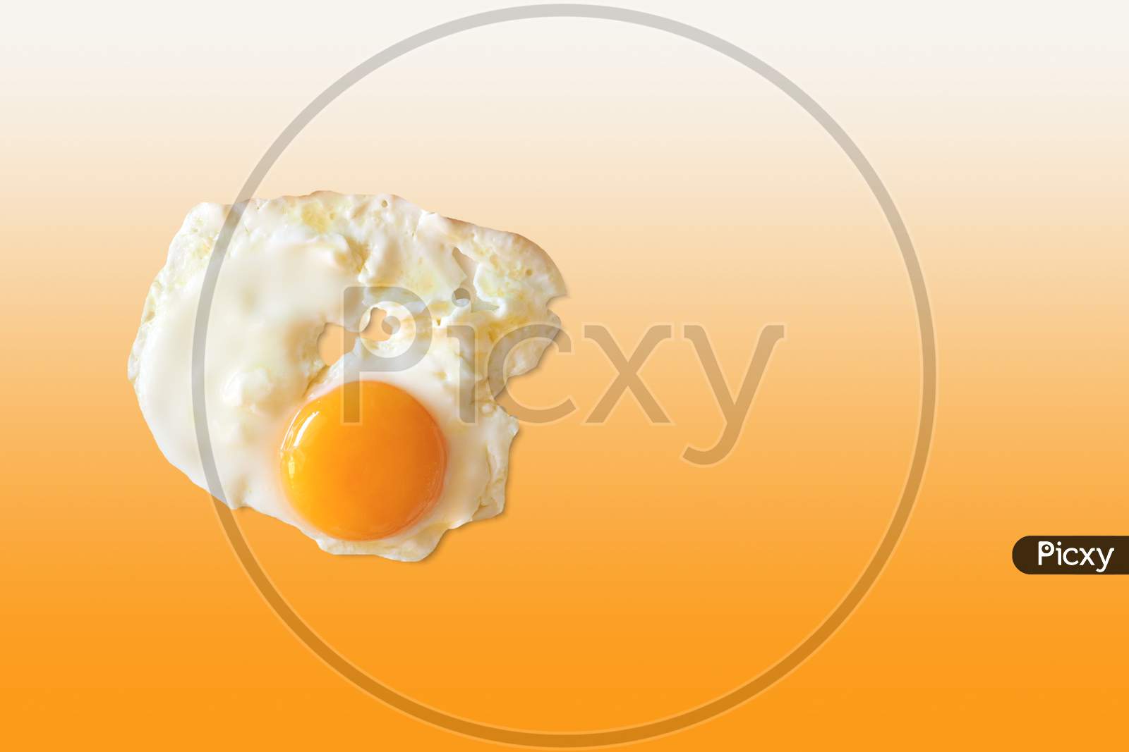 Fried Egg Over Matching Colour Background