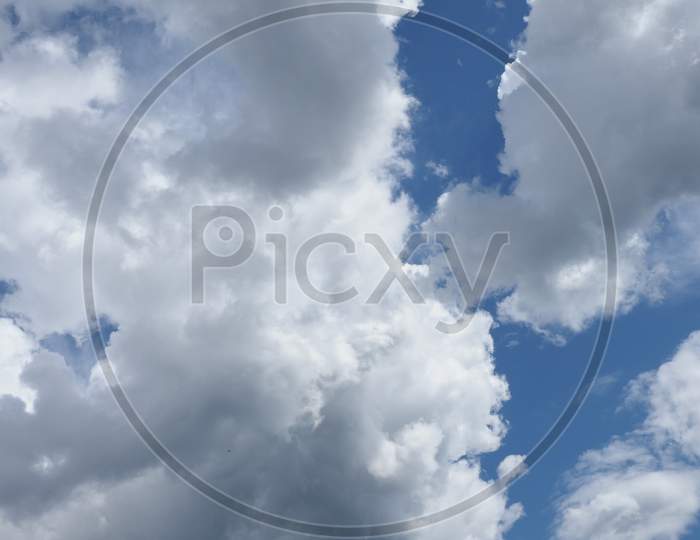 Dramatic Blue Sky With Clouds Background