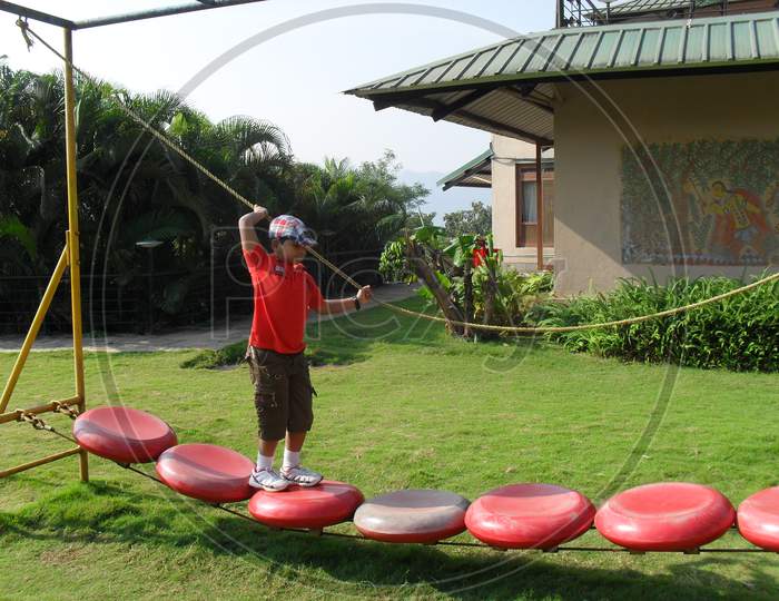 Boy playing in the play ground