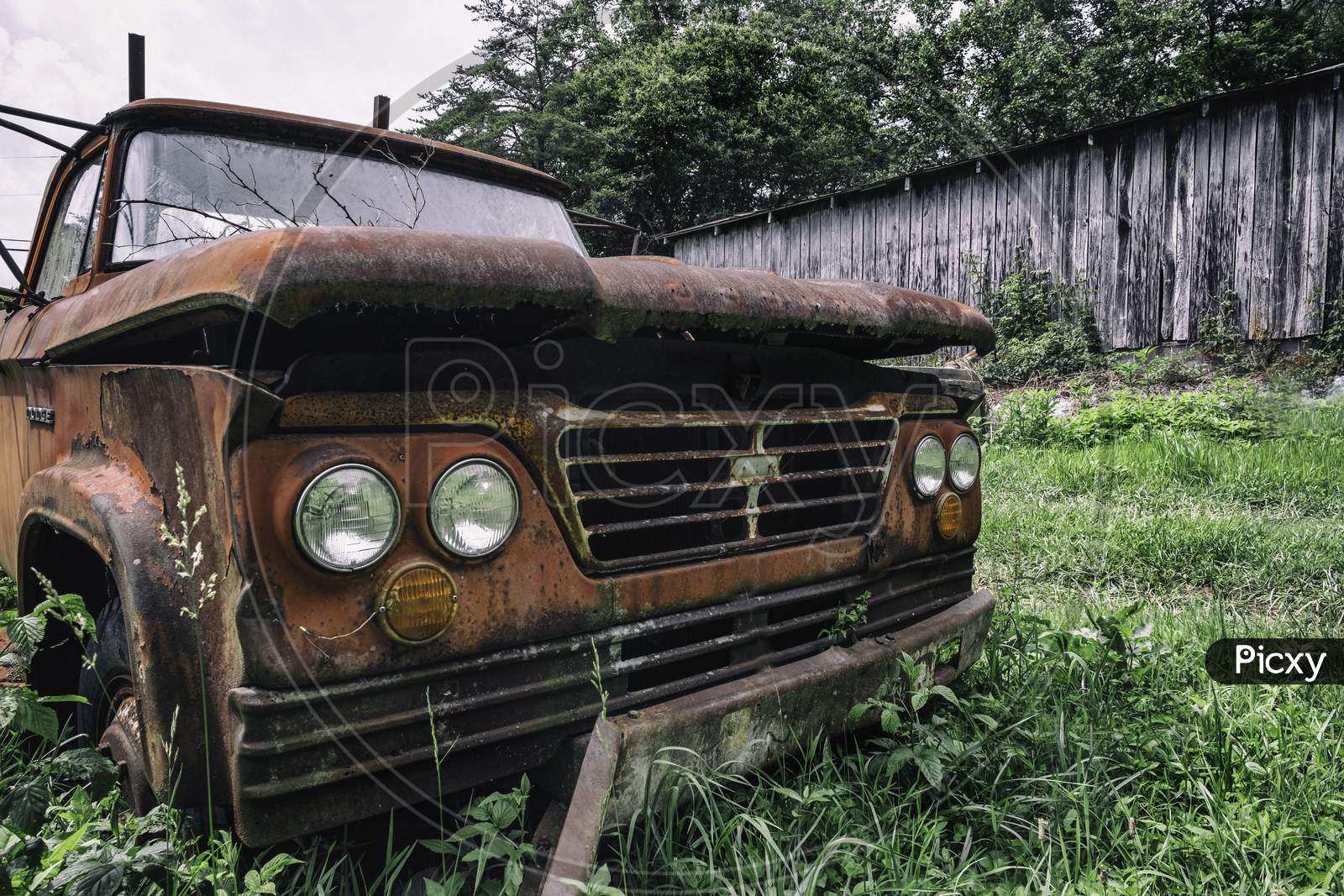Old Rusted Car In Grass, Field
