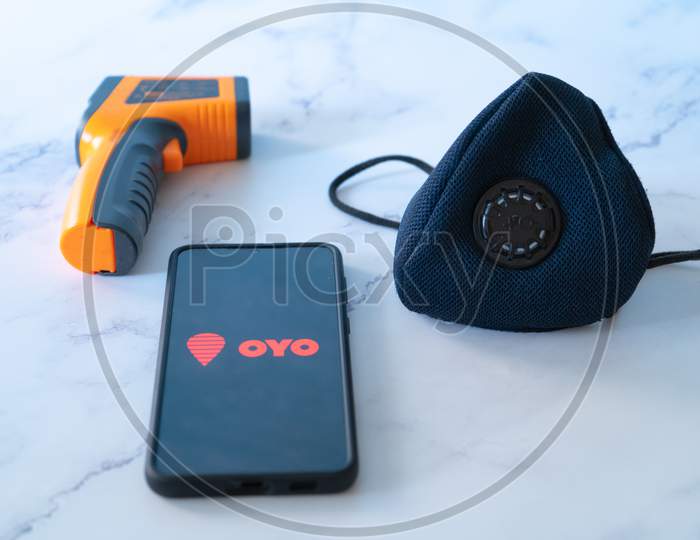 Indian Startup Unicorn Invested Company Oyo Rooms Which Is In The Travel And Hospitality Industry Which Has Geared For The Coronavirus Covid19 Pandemic With Thermometer And Masks For Safety