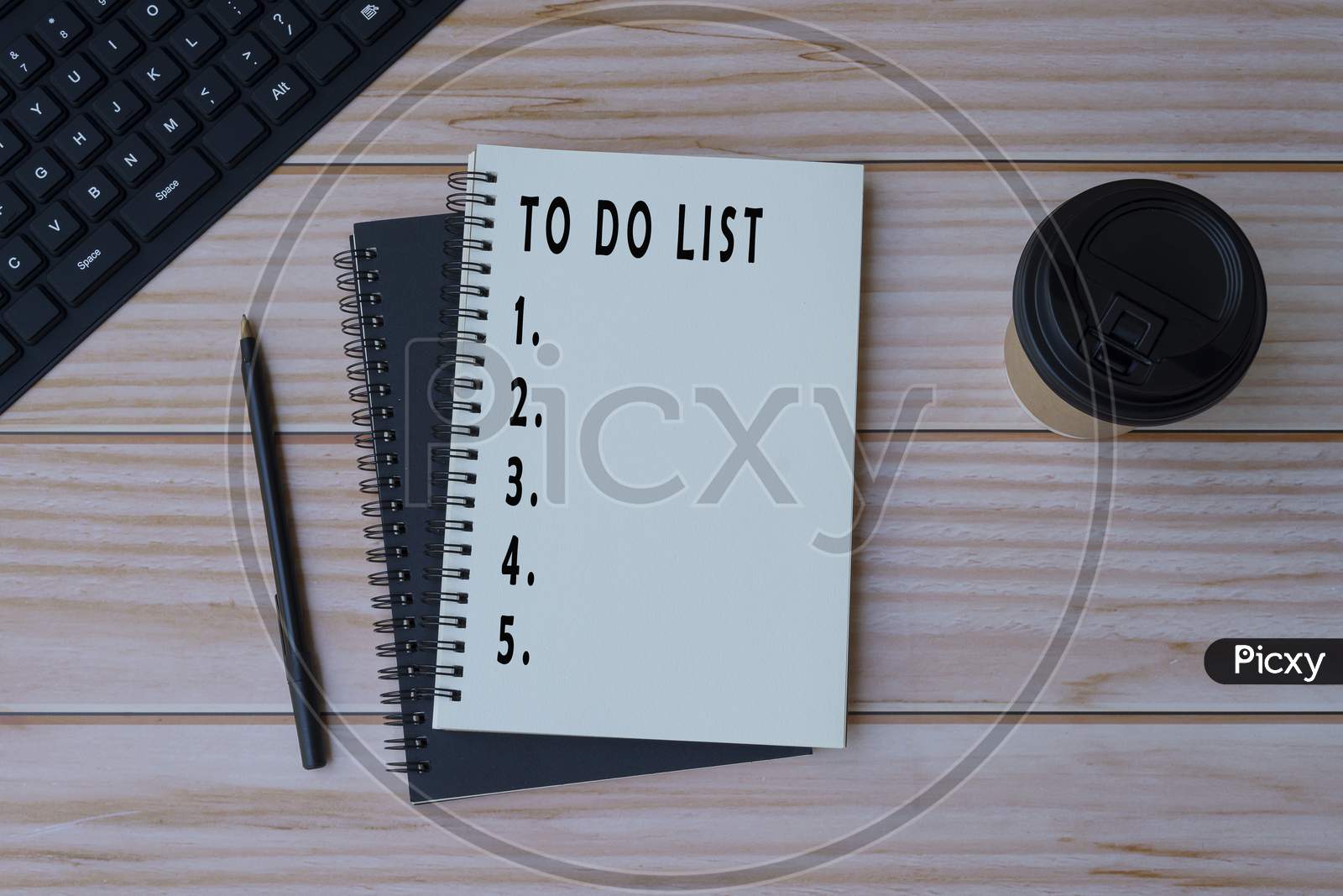 Text On Notepad On Wooden Desk - To Do List