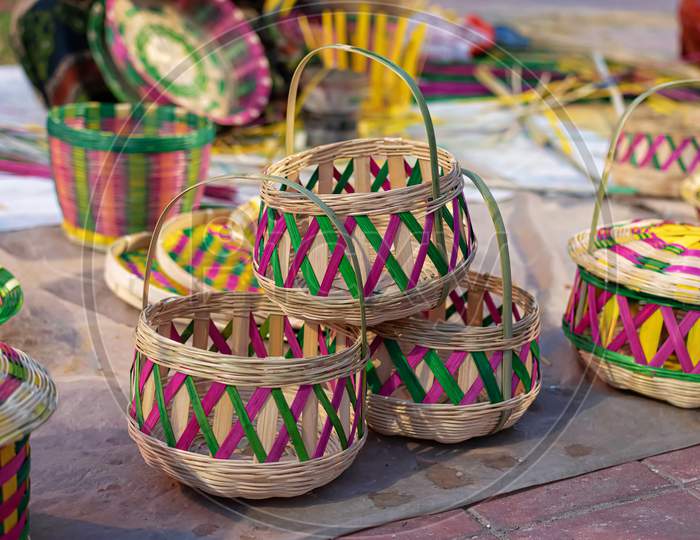 Beautiful Handmade Flower Basket Made By Bamboo Is Displayed In A Shop For Sale In Blurred Background. Indian Handicraft