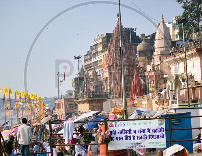 Varanasi, India - November 01, 2016: View Of A Prayag Ghat With Old Temple And Dome Architecture Which Is A Famous Holy Landmark For Hindu Pilgrims Or Devotee Next To Ganges River.Uttar Pradesh