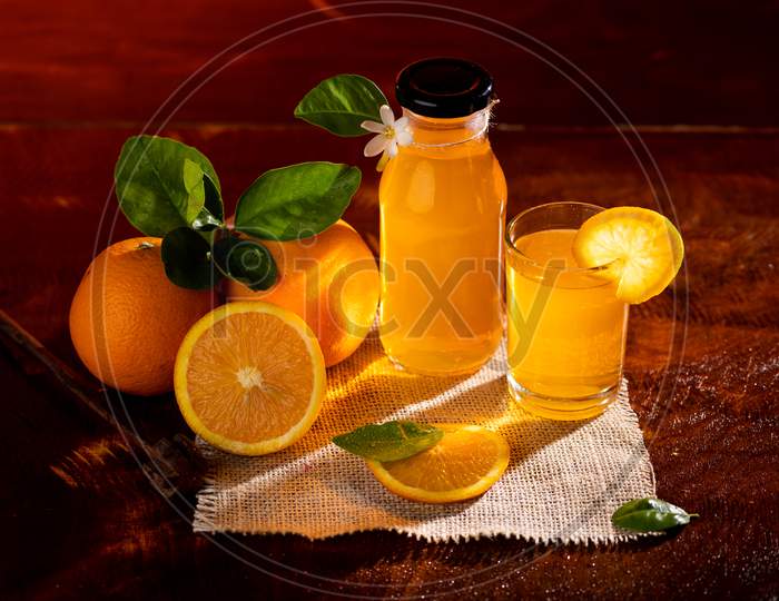 Fresh Orange Juice In The Glass Jar.